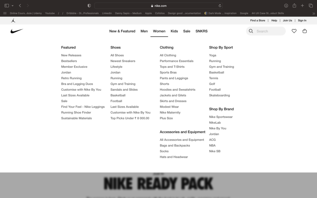 Nike Website's women's section dropped down showing a large number of categories including featured, shoes, clothing, accessories and equipment, shop by sport and shop by brand 